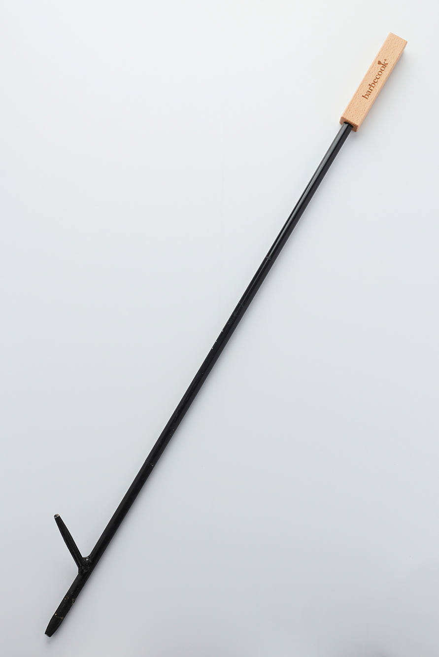 Tisonnier avec trou de soufflage